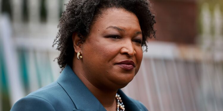 Her career blends law politics writing and business success (Photo: Stacey Abrams/Alamy)