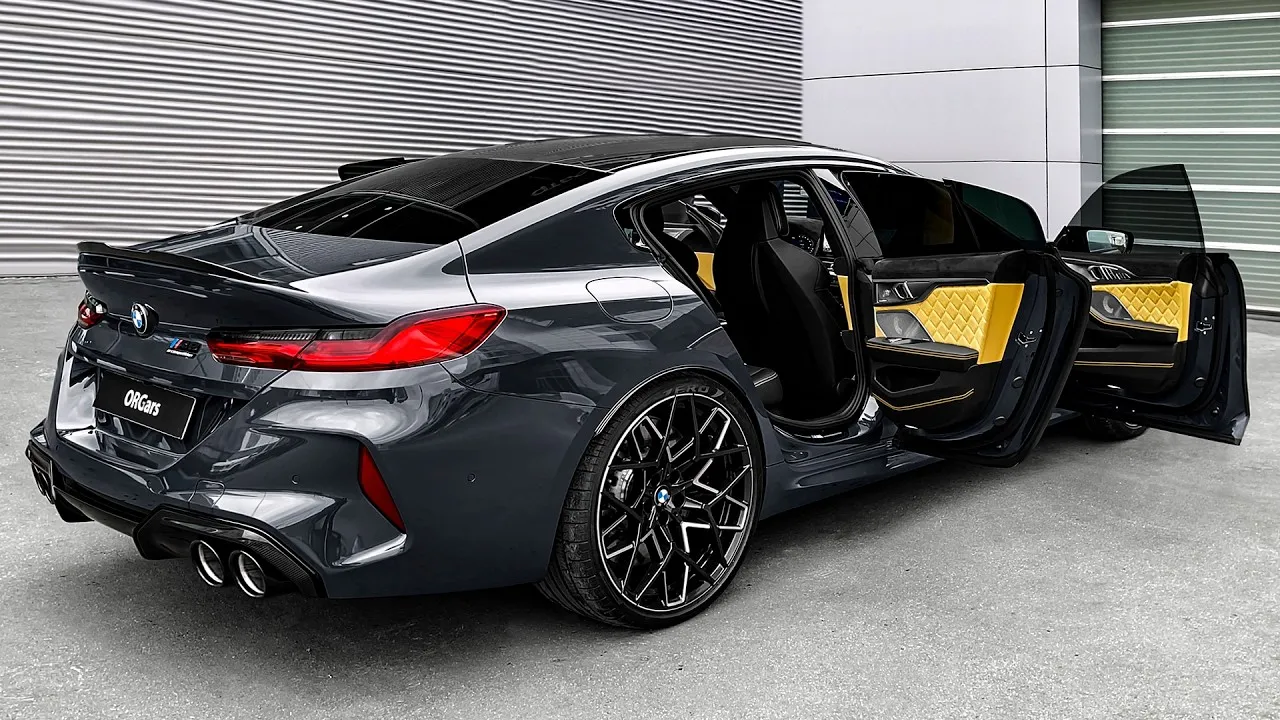 BMW M8 Gran Coupe Competition with opened doors